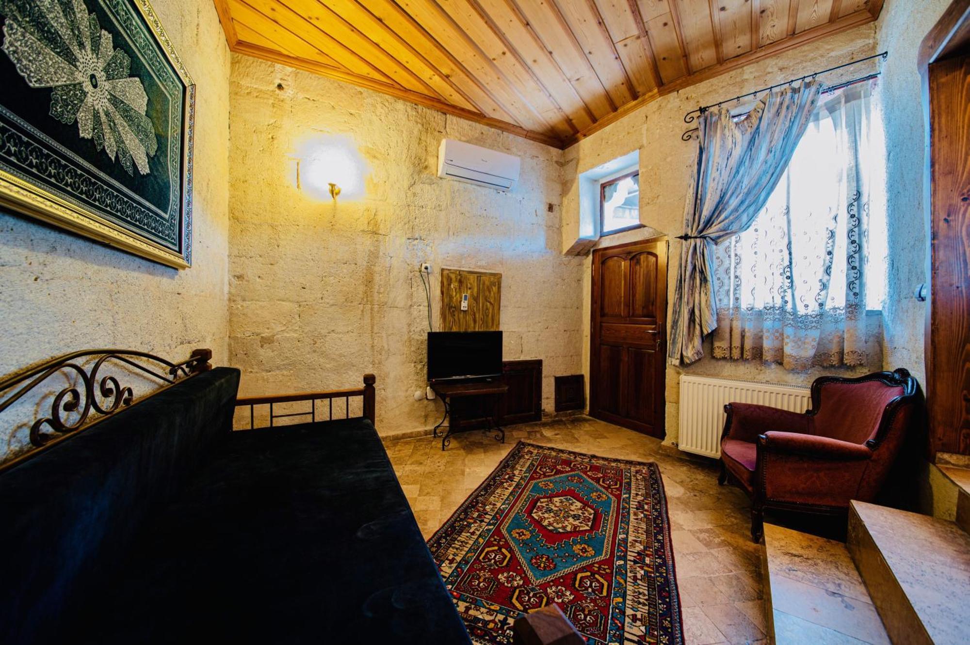 Chelebi Cave Suites Plus 6 Years Old Goreme Room photo